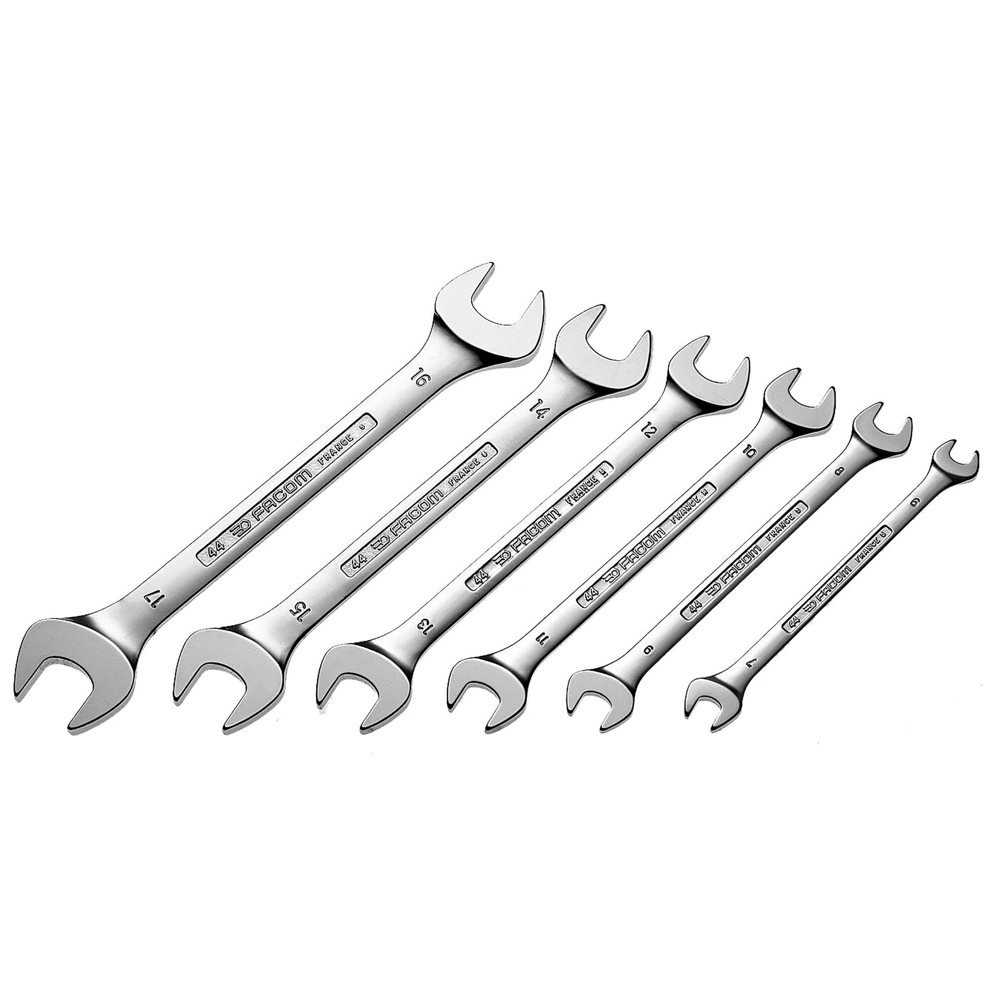 Facom 44_JU6 set of seven chrome open-end wrenches, photography, top angle on white background.